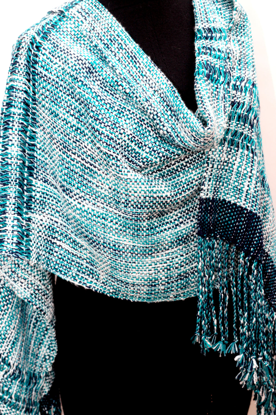 Silky soft large shawl wrap with leno highlights.